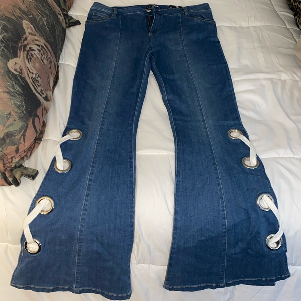 Stunning bell bottom jeans tied up sides